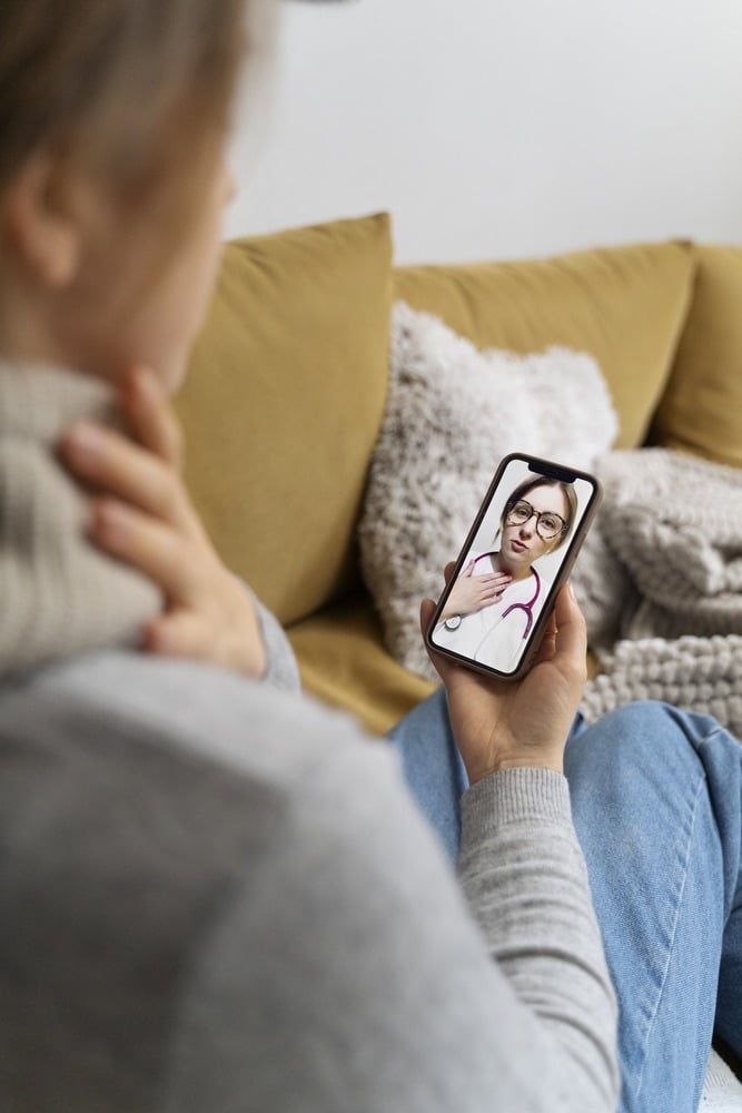 patient having teleconsultation with doctor 1